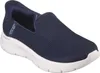 A single navy blue Skechers slip-on shoe with a white sole is shown against a white background. Produktbild-Vorschau