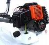 Close-up of a gas-powered engine for a scythe or trimmer. Produktbild-Vorschau
