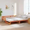 A wooden daybed with a mattress and pillows in a room with artwork on the wall and a window. Podgląd zdjęcia produktu