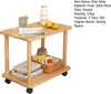A wooden side table with two tiers, displaying various items on its surfaces. Produktbild-Vorschau