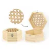 A hexagonal wooden box with a cane lid, shown open and closed, with a close-up of the cane pattern. Produktbild-Vorschau