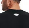 Close-up of the back of a black t-shirt with a logo on the collar. Náhľad obrázku produktu
