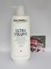 A bottle of Goldwell Dualsenses Ultra Volume Bodifying Shampoo is shown next to a small printed photograph of a man. Anteprima dell’immagine prodotto