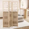 A room divider is set up in a bedroom, partially separating the sleeping area from a small bar counter with stools. Voir les images du produit