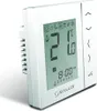 A white digital thermostat is shown at an angle against a white background. Náhľad obrázku produktu