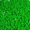 A pile of small green LEGO flower pieces. Produktbild-Vorschau