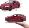 A red Alfa Romeo Stelvio model car is shown from two different angles, with dimensions indicated. The bottom image shows the car being held in a hand. Podgląd zdjęcia produktu