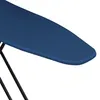 A close-up view of a blue ironing board with black legs. Produktbild-Vorschau