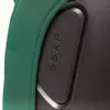 A close-up view of a green strap attached to a black product with embossed text. Podgląd zdjęcia produktu