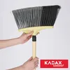 Hands holding a broom. Podgląd zdjęcia produktu