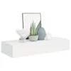 A white floating shelf with decorative items on it. Produktbild-Vorschau