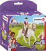 A Schleich Horse Club toy set packaging featuring Sofia and Blossom figures in a grassy field setting. Náhľad obrázku produktu