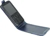 A black Nokia phone in a blue flip case, shown against a white background. Náhled obrázku produktu