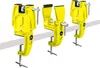 Three yellow ski vises clamped to a white bar. Náhľad obrázku produktu