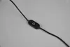A close-up shot of a black power cord with an in-line switch featuring a white power symbol. Náhľad obrázku produktu