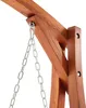 A close-up view of the wooden frame and metal chain of a swing. Náhled obrázku produktu