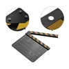 A black and yellow film clapperboard is shown against a white background, with close-up insets highlighting its construction. Náhled obrázku produktu