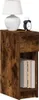A bedside table with a drawer and an open shelf, displaying a lamp and an alarm clock on top, and books on the shelf. Podgląd zdjęcia produktu