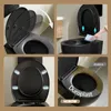 A collage of four images showcasing a black toilet, its features, and cleaning. Náhľad obrázku produktu