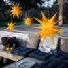 Outdoor seating area with decorative star lights hanging above. Produktbild-Vorschau