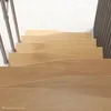 A close-up view of a wooden staircase with metal railings, seen from above. Produktbild-Vorschau