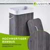 A grey bamboo laundry basket with a white liner and a lid, shown with a close-up detail of the bamboo texture. Náhľad obrázku produktu