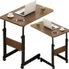 Two adjustable height tables with wooden tops and black metal frames, placed diagonally. One table is larger than the other. Both tables have a laptop, a cup, a saucer, and a small potted plant on them. Podgląd zdjęcia produktu