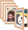 A collection of wooden picture frames with different illustrations inside, arranged in a staggered formation. Produktbild-Vorschau