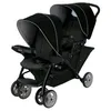 A black Graco Stadium Duo double stroller is shown against a white background. Voir les images du produit