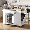 A white kitchen island with a wooden countertop is shown in a kitchen setting. It has drawers and cabinets, with one cabinet door open revealing shelves and another open to show a trash can. There are kitchen appliances and utensils in the background. Produktbild-Vorschau
