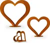 Three rusted metal heart sculptures of different sizes are displayed against a white background. Produktbild-Vorschau