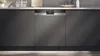A modern kitchen with a built-in dishwasher. Produktbild-Vorschau