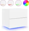 A white bedside table with two drawers, illuminated by blue LED lights from underneath. Above the table are three circular insets showing different colored lights (beige, red, green) and a color wheel. Náhled obrázku produktu