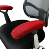 Close-up of red armrest covers on a black office chair. Produktbild-Vorschau