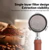 A close-up of a portafilter with coffee grounds and beans, with text overlay describing its features. Anteprima dell’immagine prodotto