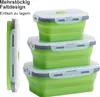 A stack of three collapsible silicone food containers in green, with one container shown folded flat on the left. Produktbild-Vorschau