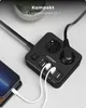 A black VOOMY 6-in-1 power strip with USB ports is shown on a light gray surface, with a smartphone plugged into one of the USB ports. Voir les images du produit