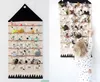 A collage of two images showing a fabric advent calendar with numbered pockets, one image showing the calendar filled with small toys and the other showing a child interacting with it. Podgląd zdjęcia produktu