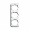 A white, three-gang modular frame for electrical outlets or switches, presented against a white background. Anteprima dell’immagine prodotto