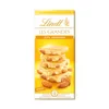 A bar of white chocolate with almonds on a yellow background. Produktbild-Vorschau