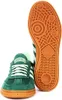 A pair of Adidas Handball Spezial sneakers, one shown from the front and the other from the sole. Produktbild-Vorschau