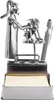 A metal sculpture of a veterinarian with a dog, serving as a desk organizer with a pen holder and a notepad holder. Náhľad obrázku produktu