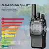 A walkie-talkie is shown in a camping setting with a graphic illustrating sound quality. Produktbild-Vorschau