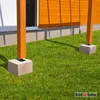 Two wooden posts are anchored in concrete bases on a green lawn, next to a building with orange siding. Podgląd zdjęcia produktu