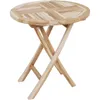 A round, foldable teak table with a patterned top and X-shaped legs, presented against a white background. Produktbild-Vorschau