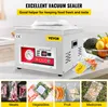 A vacuum sealer machine with various food items packaged in plastic bags below. Produktbild-Vorschau