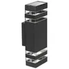 A black outdoor wall light with clear glass accents. Produktbild-Vorschau