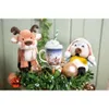 A festive arrangement featuring plush toys and Christmas ornaments. Produktbild-Vorschau