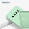 A close-up view of a light green phone case, showing the camera cutout and the interior texture. The case is partially detached from a phone. Produktbild-Vorschau