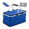 A blue picnic basket with a silver frame and black handles is shown against a white background. Insets show the basket folded and open. Anteprima dell’immagine prodotto